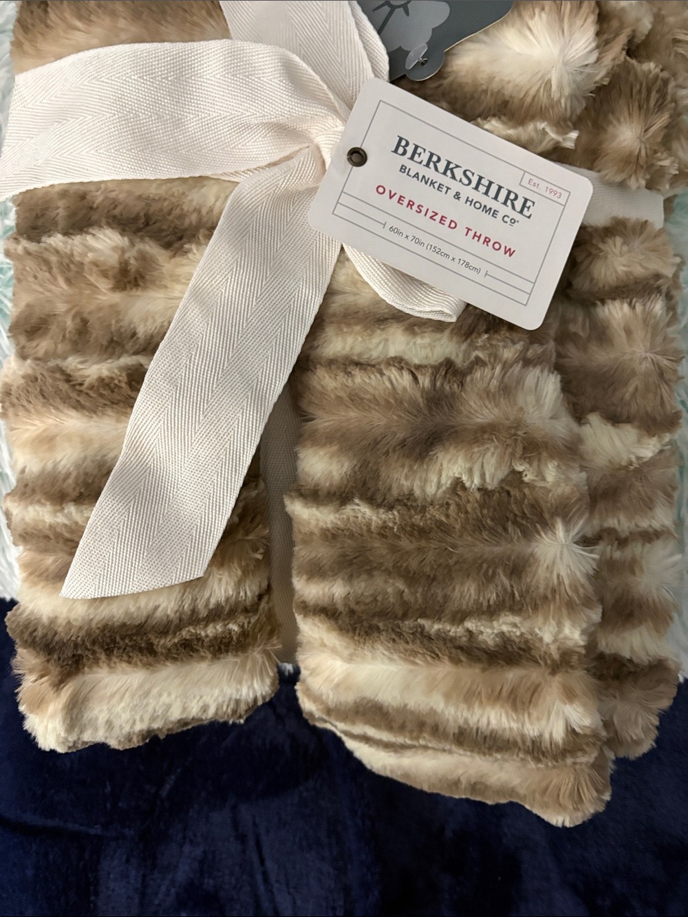 Beautiful Faux Fur in Brown & Cream Tones. Flip side is a Solid Cream Velvet
